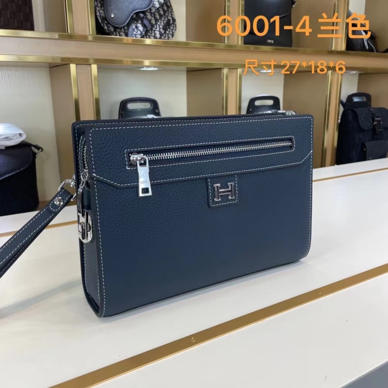 H**mes clutch bags